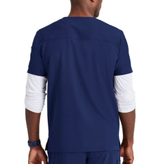 Vista trasera del blusón médico para hombre color azul índigo.