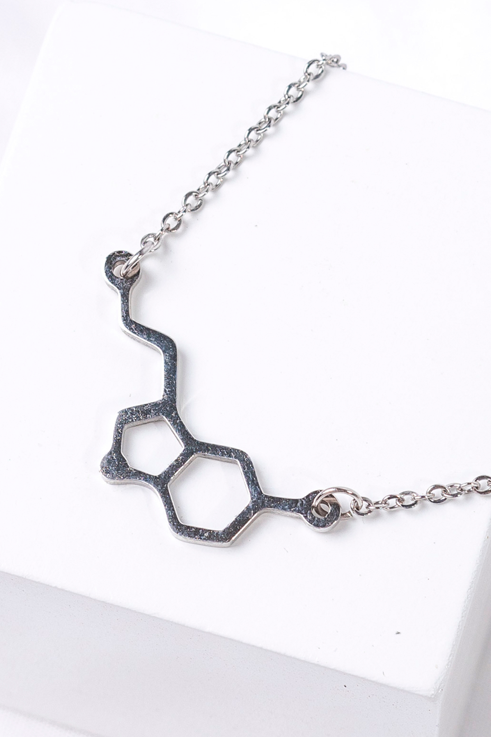 Colgante serotonina - acero acabado plata